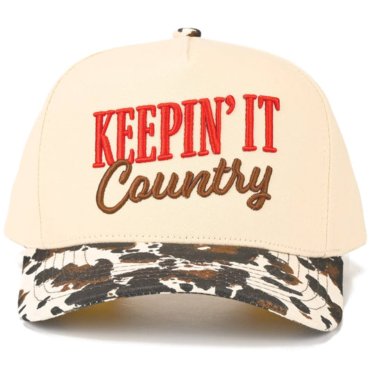 Keepin’ it County Embroidered Two Tone Cow Print Trucker Hat